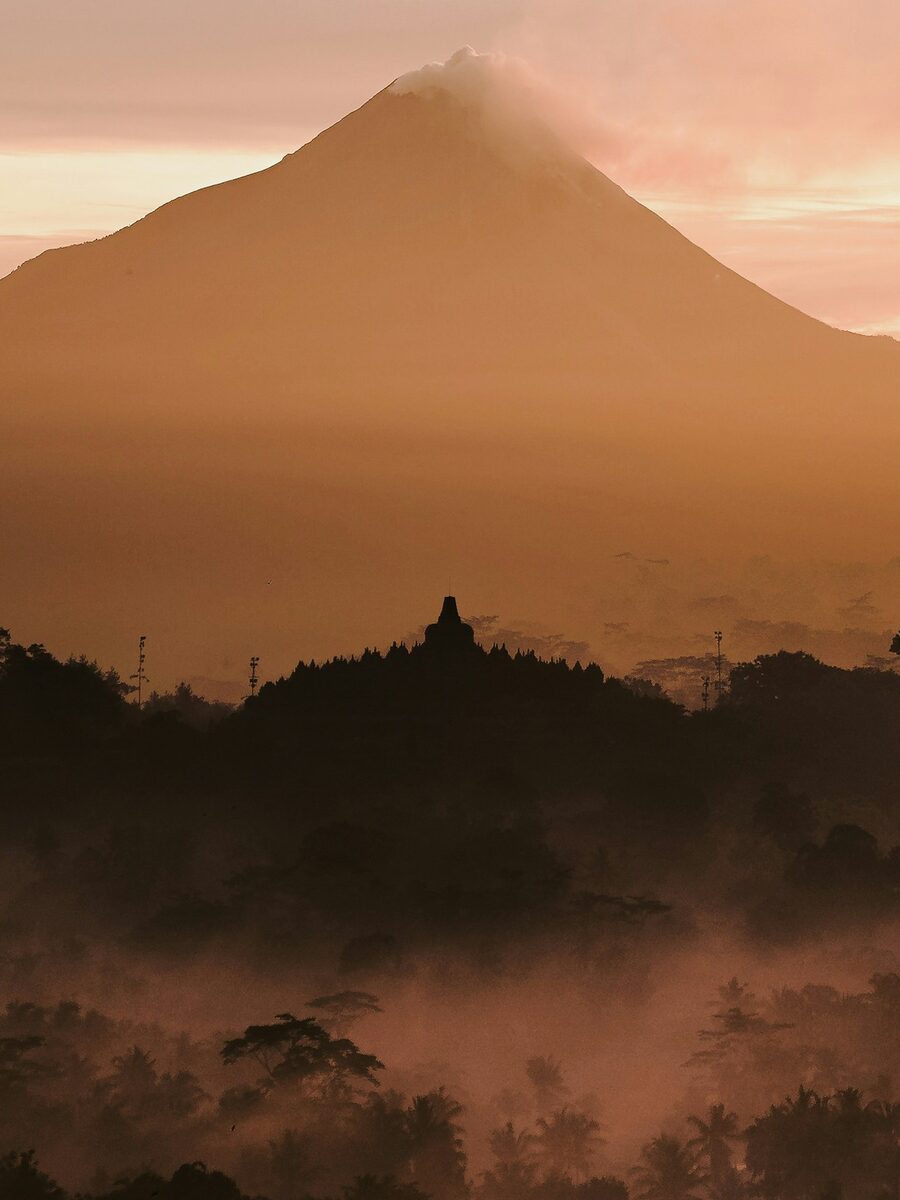 Sunrise over volcanoes on the Java overland route